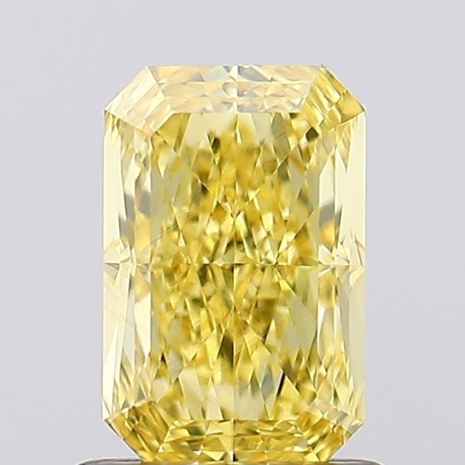 Loose Diamond - RADIANT 1.0ct Fancy Vivid Yellow VS1: Loose Diamond - RADIANT 1.0ct Fancy Vivid Yellow VS1 Source: This is a real non-mined Diamond that has been grown in a lab Shape: RADIANT Carats: 1.0 Color: Fancy Vivid Yellow Certification: IGI Video