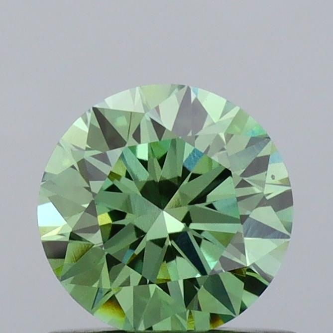 Ideal Loose Diamond - ROUND 0.61ct Fancy Vivid Green VS1: Ideal Loose Diamond - ROUND 0.61ct Fancy Vivid Green VS1 Source: This is a real non-mined Diamond that has been grown in a lab Shape: ROUND Carats: 0.61 Color: Fancy Vivid Green Certification: IGI Vid