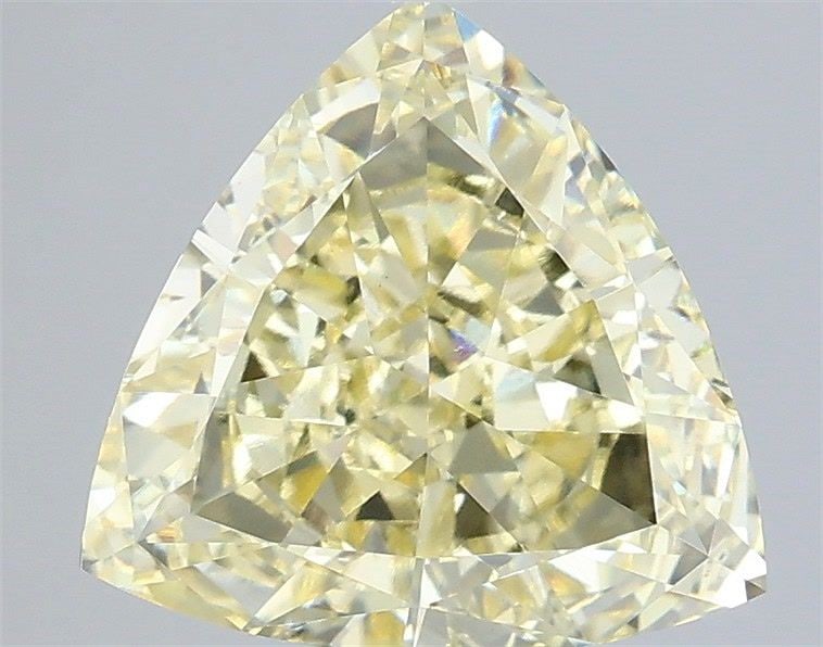 Loose Diamond - TRIANGULAR 3.09ct Fancy Yellow VVS2: Loose Diamond - TRIANGULAR 3.09ct Fancy Yellow VVS2 Source: This is a real non-mined Diamond that has been grown in a lab Shape: TRIANGULAR Carats: 3.09 Color: Fancy Yellow Certification: IGI Video: