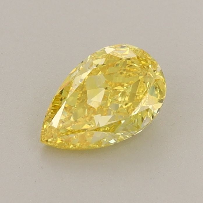 Loose Diamond - PEAR 0.7ct Fancy Vivid Yellow VVS1: Loose Diamond - PEAR 0.7ct Fancy Vivid Yellow VVS1 Source: This is a real non-mined Diamond that has been grown in a lab Shape: PEAR Carats: 0.7 Color: Fancy Vivid Yellow Certification: IGI Video: