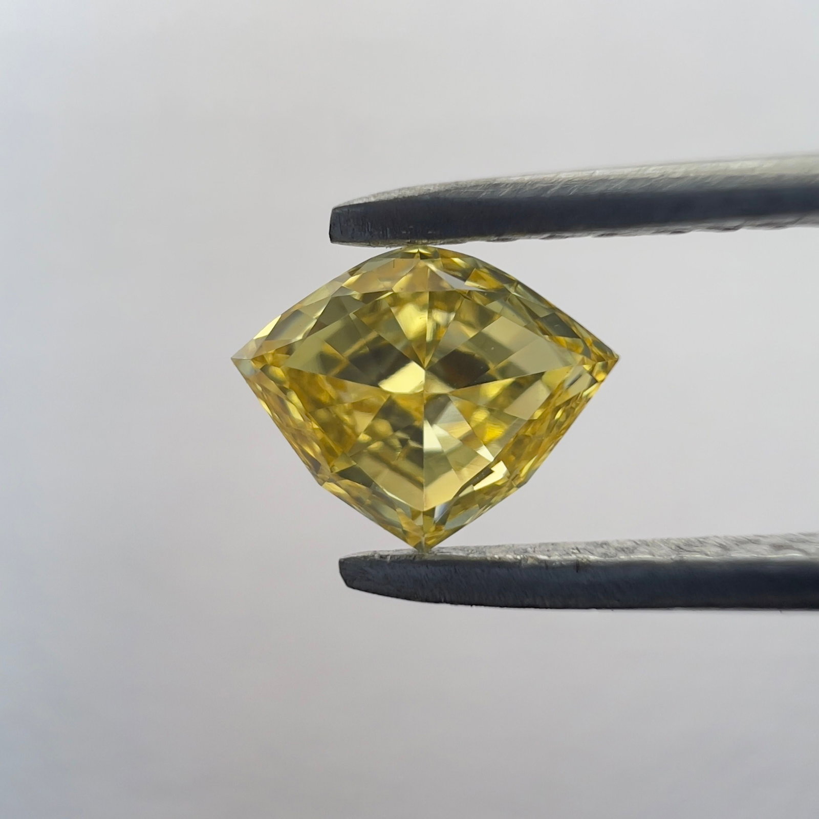 Loose Diamond - SHIELD 0.4ct Yellow VVS2: Loose Diamond - SHIELD 0.4ct Yellow VVS2 Source: This is a real non-mined Diamond that has been grown in a lab Shape: SHIELD Carats: 0.4 Color: Yellow Certification: NONE The Diamond Depot Guarantee: 