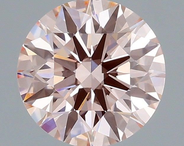 Ideal Loose Diamond - ROUND 1.04ct Fancy Pink VVS2: Ideal Loose Diamond - ROUND 1.04ct Fancy Pink VVS2 Source: This is a real non-mined Diamond that has been grown in a lab Shape: ROUND Carats: 1.04 Color: Fancy Pink Certification: IGI Video: