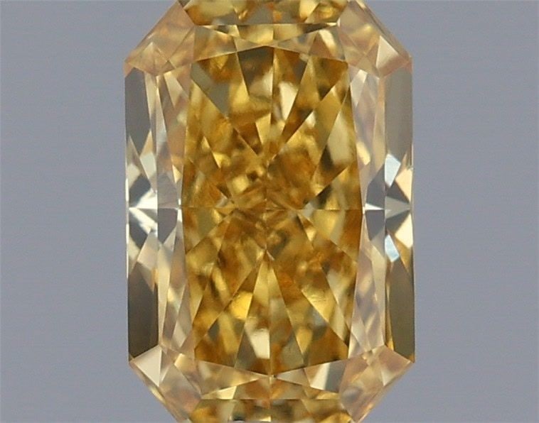Loose Diamond - RADIANT 0.55ct Fancy Vivid Yellow VS1: Loose Diamond - RADIANT 0.55ct Fancy Vivid Yellow VS1 Source: This is a real non-mined Diamond that has been grown in a lab Shape: RADIANT Carats: 0.55 Color: Fancy Vivid Yellow Certification: IGI Vid