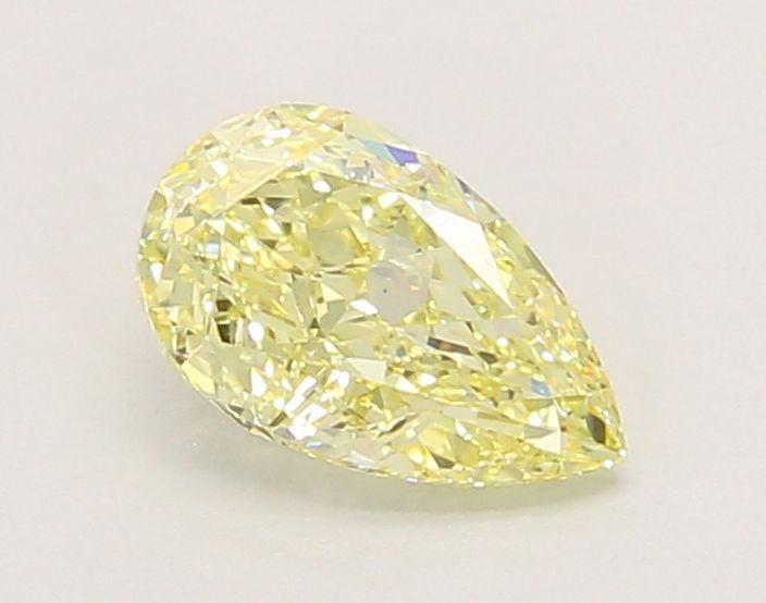 Loose Diamond - PEAR 1.04ct Fancy Yellow VS1: Loose Diamond - PEAR 1.04ct Fancy Yellow VS1 Source: This is a real non-mined Diamond that has been grown in a lab Shape: PEAR Carats: 1.04 Color: Fancy Yellow Certification: IGI Video:
