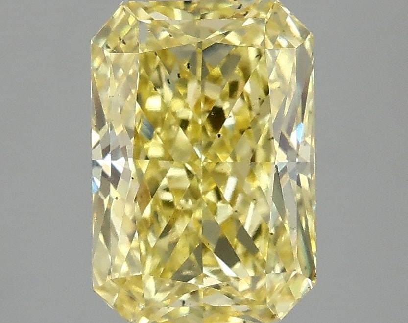 Loose Diamond - RADIANT 2.85ct Fancy Vivid Yellow SI1: Loose Diamond - RADIANT 2.85ct Fancy Vivid Yellow SI1 Source: This is a real non-mined Diamond that has been grown in a lab Shape: RADIANT Carats: 2.85 Color: Fancy Vivid Yellow Certification: IGI Vid