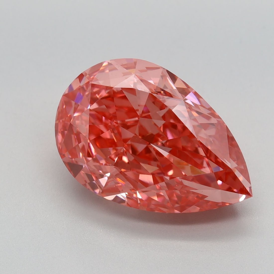Loose Diamond - PEAR 5.39ct Fancy Vivid Pink VVS2: Loose Diamond - PEAR 5.39ct Fancy Vivid Pink VVS2 Source: This is a real non-mined Diamond that has been grown in a lab Shape: PEAR Carats: 5.39 Color: Fancy Vivid Pink Certification: IGI Video: