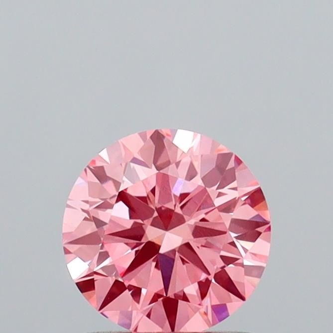 Loose Diamond - ROUND 1.09ct Fancy Vivid Pink VVS2: Loose Diamond - ROUND 1.09ct Fancy Vivid Pink VVS2 Source: This is a real non-mined Diamond that has been grown in a lab Shape: ROUND Carats: 1.09 Color: Fancy Vivid Pink Certification: IGI Video: