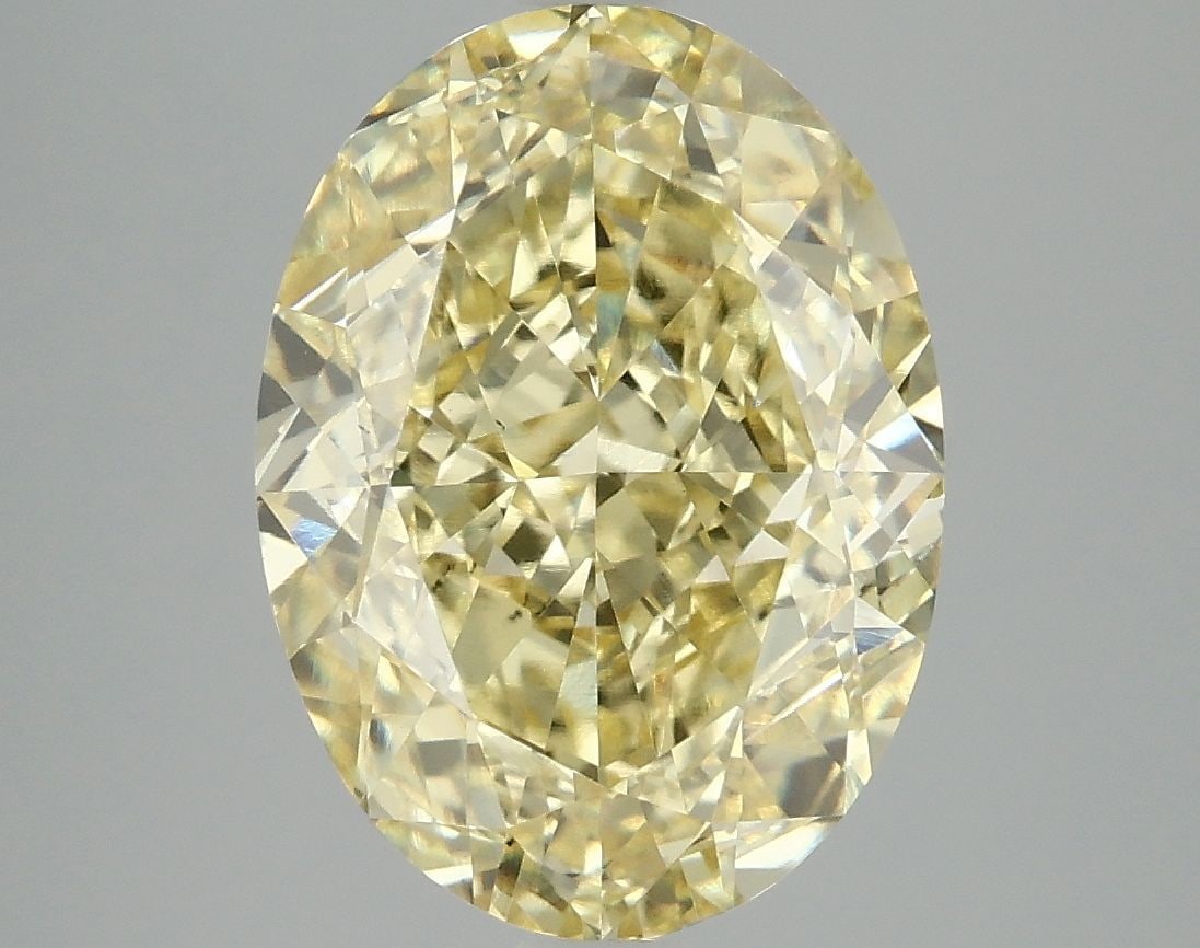 Loose Diamond - OVAL 6.03ct Fancy Vivid Yellow VS1: Loose Diamond - OVAL 6.03ct Fancy Vivid Yellow VS1 Source: This is a real non-mined Diamond that has been grown in a lab Shape: OVAL Carats: 6.03 Color: Fancy Vivid Yellow Certification: IGI Video: