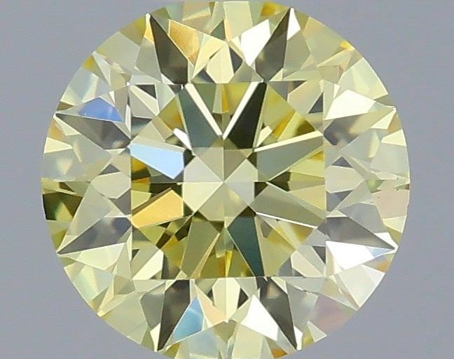 Ideal Loose Diamond - ROUND 0.37ct Fancy Yellow VVS2: Ideal Loose Diamond - ROUND 0.37ct Fancy Yellow VVS2 Source: This is a real non-mined Diamond that has been grown in a lab Shape: ROUND Carats: 0.37 Color: Fancy Yellow Certification: IGI Video: