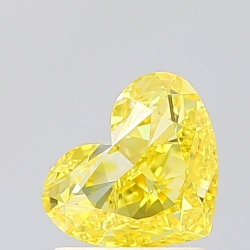 Loose Diamond - HEART 1.01ct Fancy Vivid Yellow VVS2: Loose Diamond - HEART 1.01ct Fancy Vivid Yellow VVS2 Source: This is a real non-mined Diamond that has been grown in a lab Shape: HEART Carats: 1.01 Color: Fancy Vivid Yellow Certification: IGI Video: