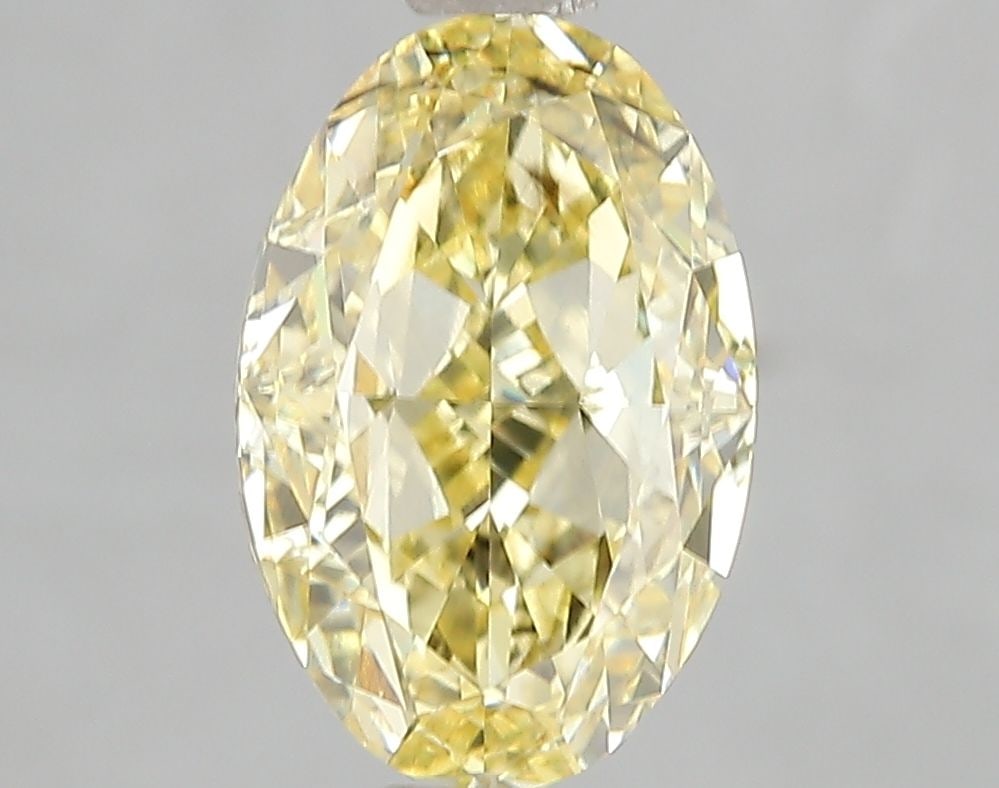 Loose Diamond - OVAL 3.01ct Fancy Vivid Yellow SI1: Loose Diamond - OVAL 3.01ct Fancy Vivid Yellow SI1 Source: This is a real non-mined Diamond that has been grown in a lab Shape: OVAL Carats: 3.01 Color: Fancy Vivid Yellow Certification: IGI Video: