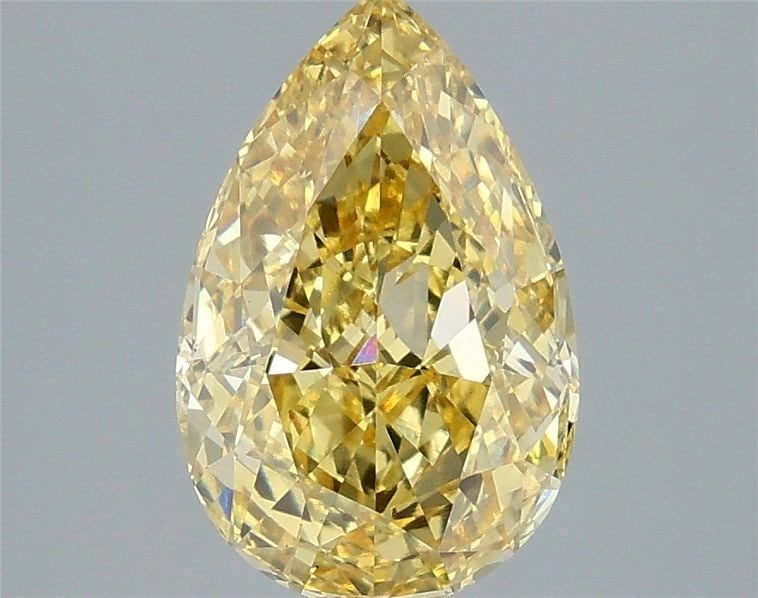 Loose Diamond - PEAR 3.1ct Fancy Vivid Yellow VS1: Loose Diamond - PEAR 3.1ct Fancy Vivid Yellow VS1 Source: This is a real non-mined Diamond that has been grown in a lab Shape: PEAR Carats: 3.1 Color: Fancy Vivid Yellow Certification: IGI Video: