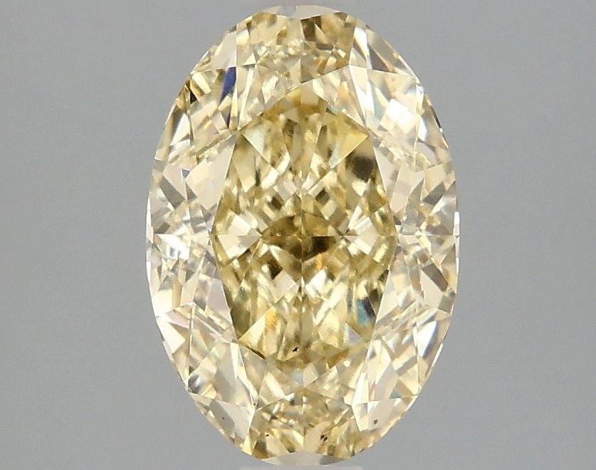 Loose Diamond - OVAL 2.1ct Fancy Intense Yellow VS1: Loose Diamond - OVAL 2.1ct Fancy Intense Yellow VS1 Source: This is a real non-mined Diamond that has been grown in a lab Shape: OVAL Carats: 2.1 Color: Fancy Intense Yellow Certification: IGI Video: