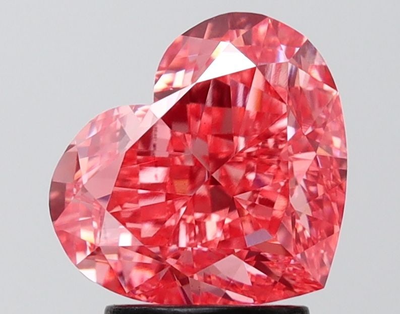 Loose Diamond - HEART 3.41ct Fancy Vivid Pink VVS2: Loose Diamond - HEART 3.41ct Fancy Vivid Pink VVS2 Source: This is a real non-mined Diamond that has been grown in a lab Shape: HEART Carats: 3.41 Color: Fancy Vivid Pink Certification: IGI Video: