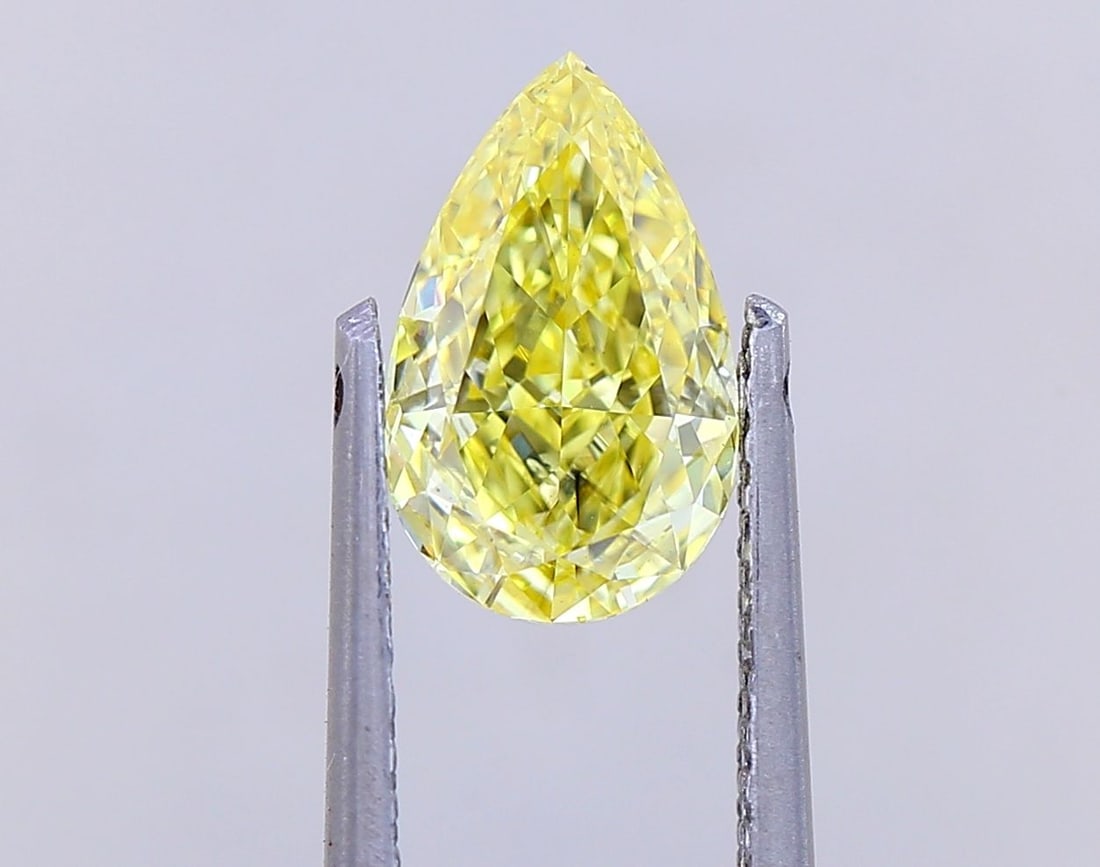 Loose Diamond - PEAR 1.1ct Fancy Intense Yellow VS2: Loose Diamond - PEAR 1.1ct Fancy Intense Yellow VS2 Source: This is a real non-mined Diamond that has been grown in a lab Shape: PEAR Carats: 1.1 Color: Fancy Intense Yellow Certification: IGI Video: