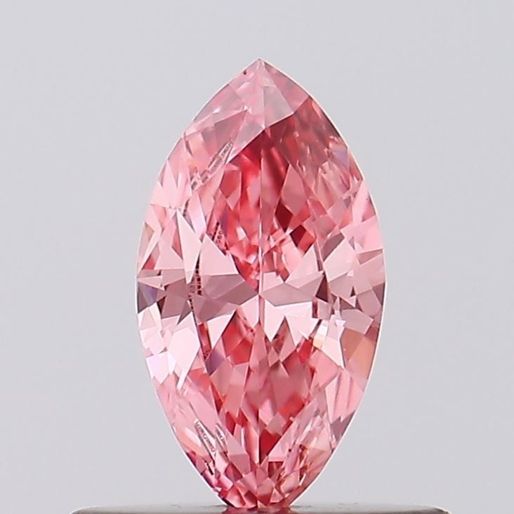 Loose Diamond - MARQUISE 0.32ct Fancy Vivid Pink VS1: Loose Diamond - MARQUISE 0.32ct Fancy Vivid Pink VS1 Source: This is a real non-mined Diamond that has been grown in a lab Shape: MARQUISE Carats: 0.32 Color: Fancy Vivid Pink Certification: IGI Video