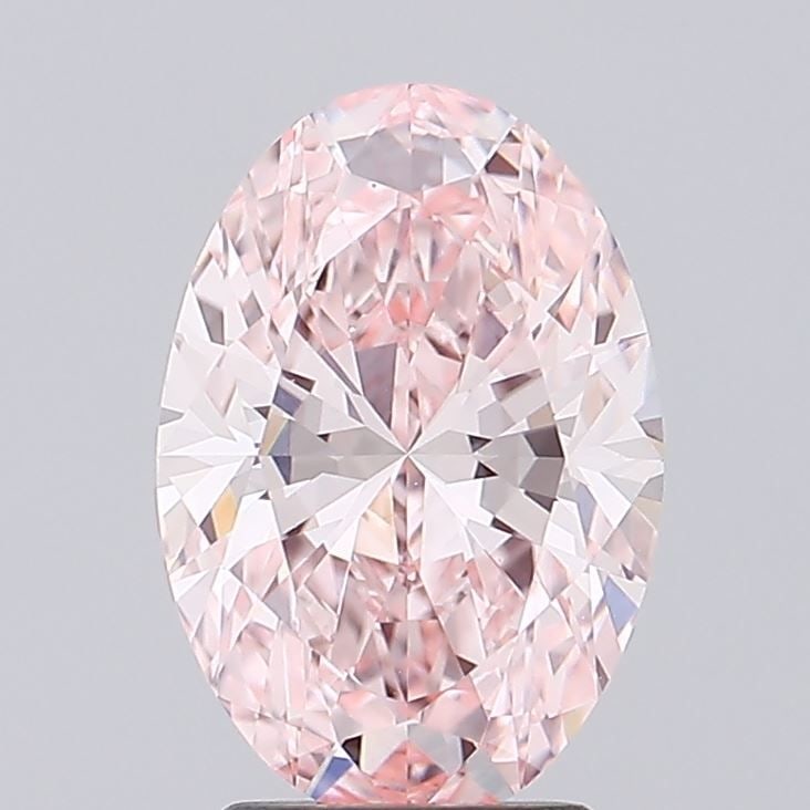 Loose Diamond - OVAL 3.05ct Fancy Vivid Pink VVS2: Loose Diamond - OVAL 3.05ct Fancy Vivid Pink VVS2 Source: This is a real non-mined Diamond that has been grown in a lab Shape: OVAL Carats: 3.05 Color: Fancy Vivid Pink Certification: IGI Video: