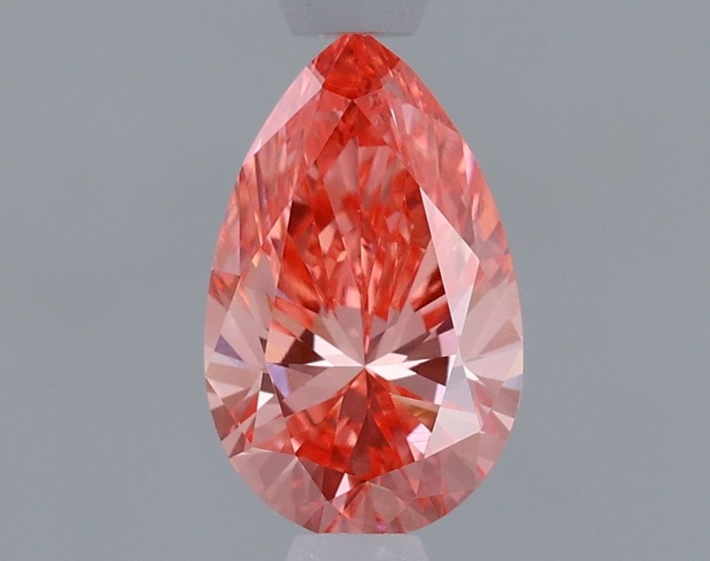 Loose Diamond - PEAR 0.92ct Fancy Vivid Pink VS1: Loose Diamond - PEAR 0.92ct Fancy Vivid Pink VS1 Source: This is a real non-mined Diamond that has been grown in a lab Shape: PEAR Carats: 0.92 Color: Fancy Vivid Pink Certification: IGI Video: