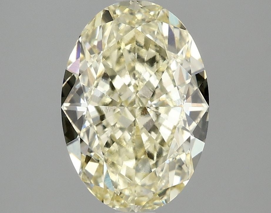 Loose Diamond - OVAL 3.1ct Fancy Vivid Yellow VVS2: Loose Diamond - OVAL 3.1ct Fancy Vivid Yellow VVS2 Source: This is a real non-mined Diamond that has been grown in a lab Shape: OVAL Carats: 3.1 Color: Fancy Vivid Yellow Certification: IGI Video: