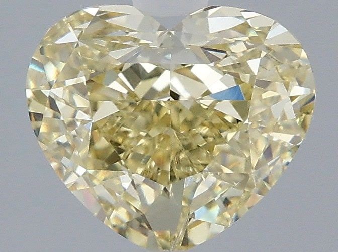 Loose Diamond - HEART 2.52ct Fancy Yellow VS1: Loose Diamond - HEART 2.52ct Fancy Yellow VS1 Source: This is a real non-mined Diamond that has been grown in a lab Shape: HEART Carats: 2.52 Color: Fancy Yellow Certification: IGI Video: