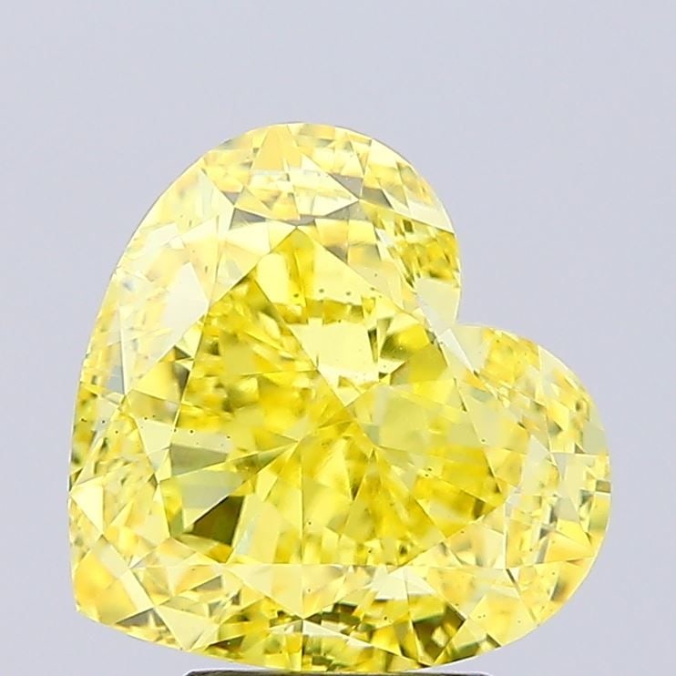 Loose Diamond - HEART 6.08ct Fancy Vivid Yellow VS1: Loose Diamond - HEART 6.08ct Fancy Vivid Yellow VS1 Source: This is a real non-mined Diamond that has been grown in a lab Shape: HEART Carats: 6.08 Color: Fancy Vivid Yellow Certification: IGI Video: