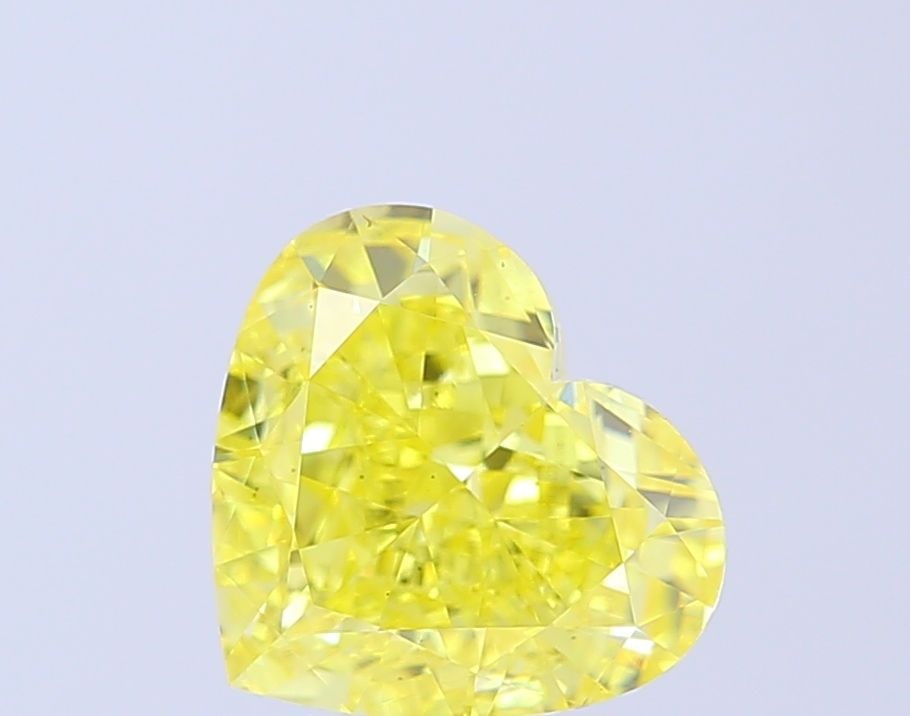 Loose Diamond - HEART 3.73ct Fancy Vivid Yellow VS2: Loose Diamond - HEART 3.73ct Fancy Vivid Yellow VS2 Source: This is a real non-mined Diamond that has been grown in a lab Shape: HEART Carats: 3.73 Color: Fancy Vivid Yellow Certification: IGI Video: