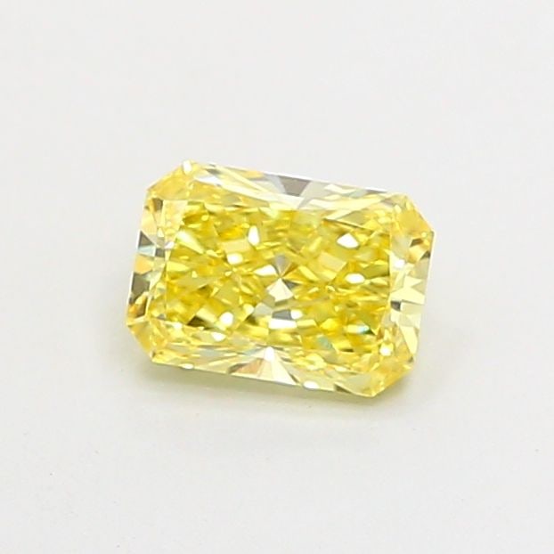 Loose Diamond - RADIANT 0.74ct Fancy Vivid Yellow VVS2: Loose Diamond - RADIANT 0.74ct Fancy Vivid Yellow VVS2 Source: This is a real non-mined Diamond that has been grown in a lab Shape: RADIANT Carats: 0.74 Color: Fancy Vivid Yellow Certification: IGI Th