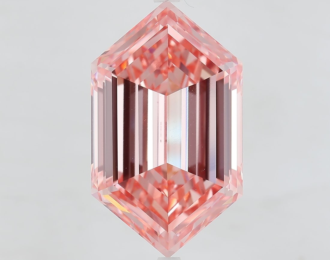 Loose Diamond - HEXAGONAL 14.08ct Fancy Vivid Pink VVS2: Loose Diamond - HEXAGONAL 14.08ct Fancy Vivid Pink VVS2 Source: This is a real non-mined Diamond that has been grown in a lab Shape: HEXAGONAL Carats: 14.08 Color: Fancy Vivid Pink Certification: IGI 