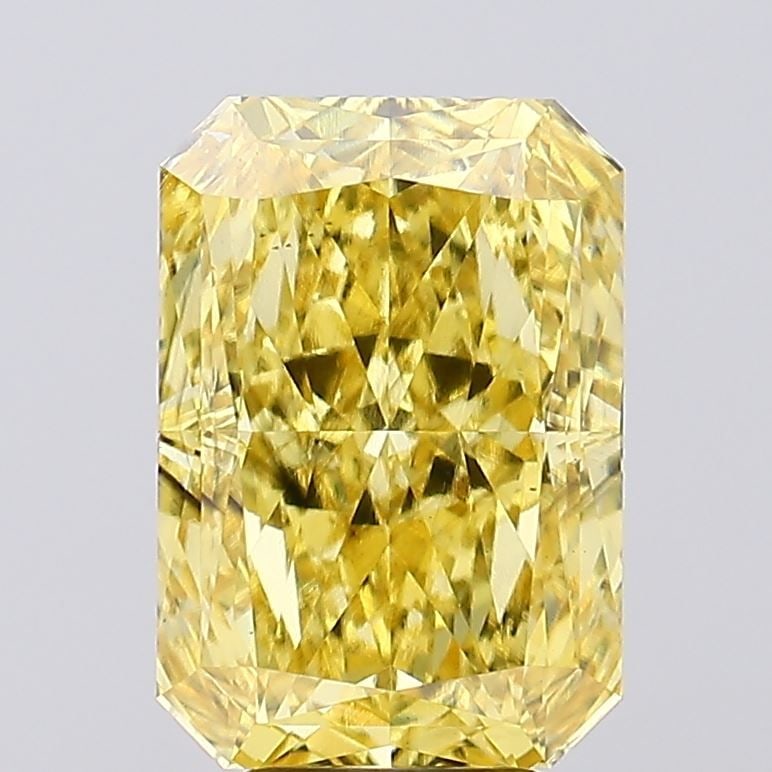 Loose Diamond - RADIANT 6.6ct Fancy Vivid Yellow SI1: Loose Diamond - RADIANT 6.6ct Fancy Vivid Yellow SI1 Source: This is a real non-mined Diamond that has been grown in a lab Shape: RADIANT Carats: 6.6 Color: Fancy Vivid Yellow Certification: IGI Video