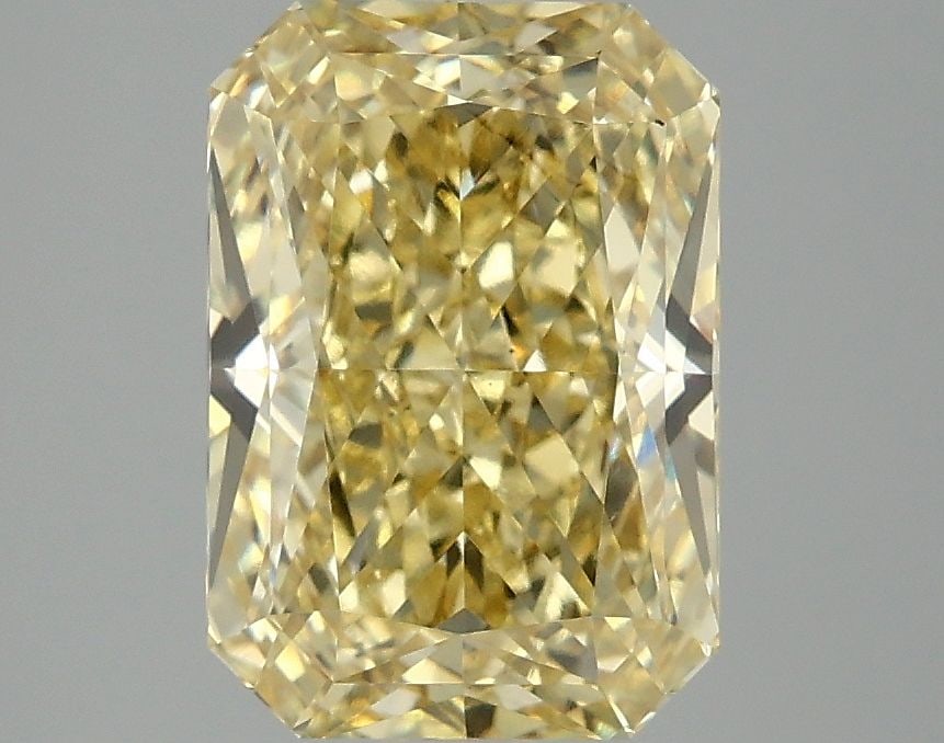 Loose Diamond - RADIANT 3.05ct Fancy Vivid Yellow VS2: Loose Diamond - RADIANT 3.05ct Fancy Vivid Yellow VS2 Source: This is a real non-mined Diamond that has been grown in a lab Shape: RADIANT Carats: 3.05 Color: Fancy Vivid Yellow Certification: IGI Vid