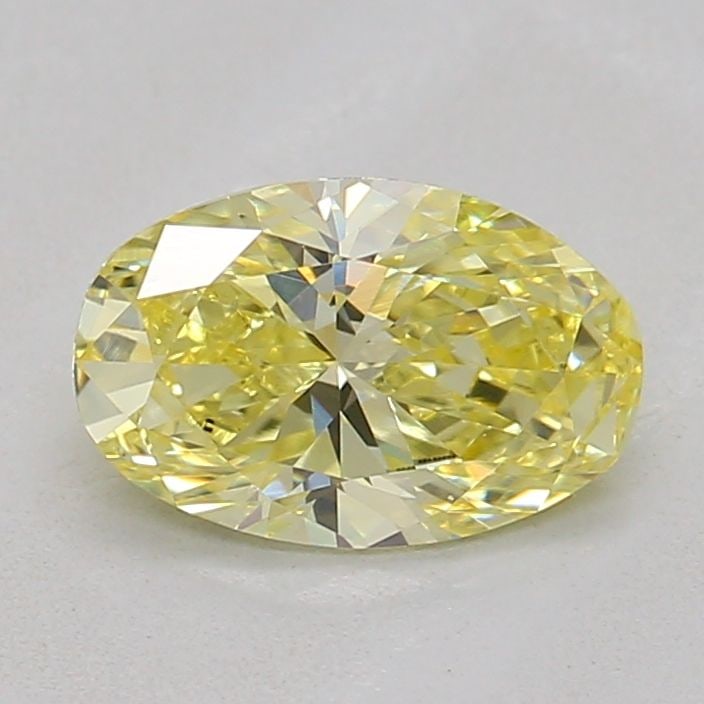 Loose Diamond - OVAL 0.69ct Fancy Yellow VVS2: Loose Diamond - OVAL 0.69ct Fancy Yellow VVS2 Source: This is a real non-mined Diamond that has been grown in a lab Shape: OVAL Carats: 0.69 Color: Fancy Yellow Certification: IGI Video: