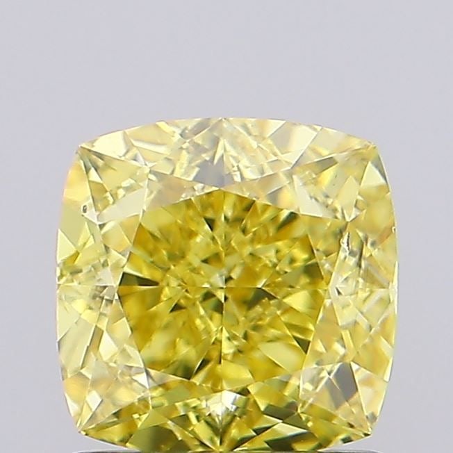 Loose Diamond - CUSHION MODIFIED 1.25ct Fancy Vivid Yellow VS2: Loose Diamond - CUSHION MODIFIED 1.25ct Fancy Vivid Yellow VS2 Source: This is a real non-mined Diamond that has been grown in a lab Shape: CUSHION MODIFIED Carats: 1.25 Color: Fancy Vivid Yellow Cert