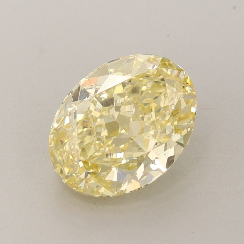 Loose Diamond - OVAL 2.08ct Fancy Vivid Yellow VS2: Loose Diamond - OVAL 2.08ct Fancy Vivid Yellow VS2 Source: This is a real non-mined Diamond that has been grown in a lab Shape: OVAL Carats: 2.08 Color: Fancy Vivid Yellow Certification: IGI Video: