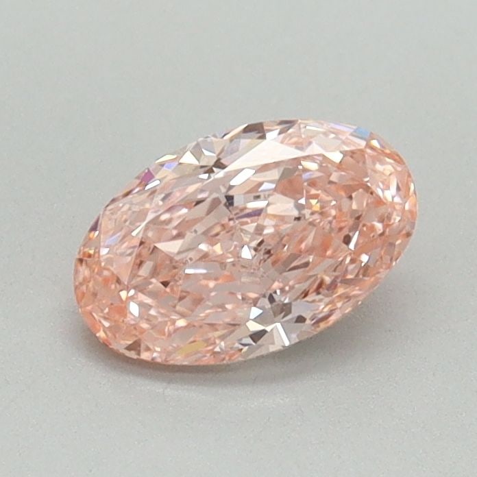 Loose Diamond - OVAL 0.59ct Fancy Vivid Pink VVS2: Loose Diamond - OVAL 0.59ct Fancy Vivid Pink VVS2 Source: This is a real non-mined Diamond that has been grown in a lab Shape: OVAL Carats: 0.59 Color: Fancy Vivid Pink Certification: IGI Video:
