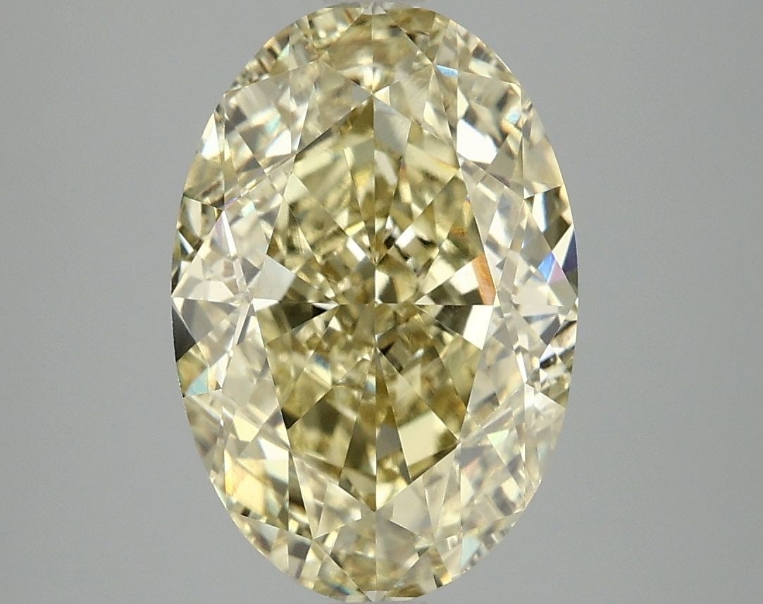 Loose Diamond - OVAL 5.0ct Fancy Vivid Yellow VS1: Loose Diamond - OVAL 5.0ct Fancy Vivid Yellow VS1 Source: This is a real non-mined Diamond that has been grown in a lab Shape: OVAL Carats: 5.0 Color: Fancy Vivid Yellow Certification: IGI Video: