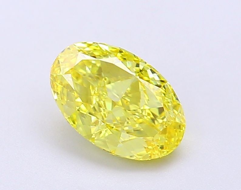 Loose Diamond - OVAL 1.27ct Fancy Vivid Yellow VS1: Loose Diamond - OVAL 1.27ct Fancy Vivid Yellow VS1 Source: This is a real non-mined Diamond that has been grown in a lab Shape: OVAL Carats: 1.27 Color: Fancy Vivid Yellow Certification: IGI Video: