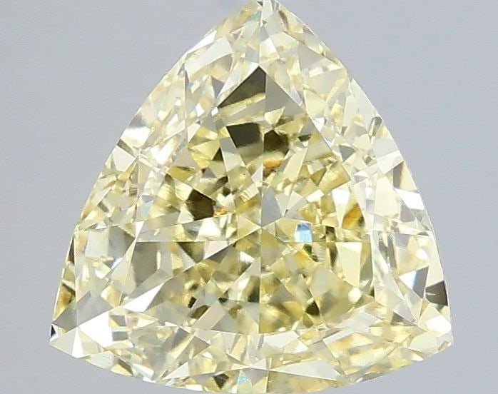 Loose Diamond - TRIANGULAR 2.05ct Fancy Yellow VS1: Loose Diamond - TRIANGULAR 2.05ct Fancy Yellow VS1 Source: This is a real non-mined Diamond that has been grown in a lab Shape: TRIANGULAR Carats: 2.05 Color: Fancy Yellow Certification: IGI Video:
