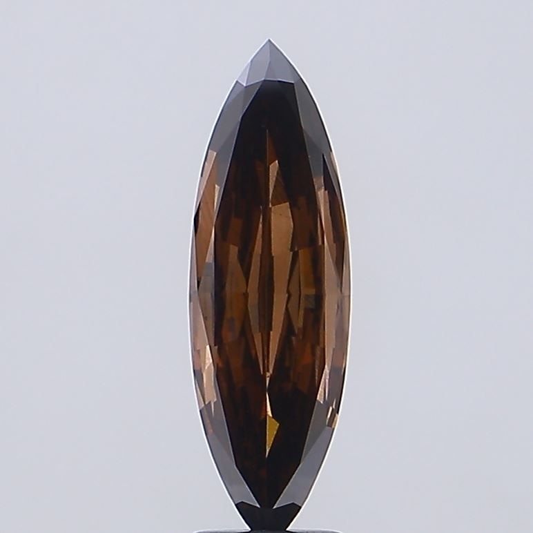 Loose Diamond - MARQUISE 3.04ct Fancy Light Brown VS2: Loose Diamond - MARQUISE 3.04ct Fancy Light Brown VS2 Source: This is a real non-mined Diamond that has been grown in a lab Shape: MARQUISE Carats: 3.04 Color: Fancy Light Brown Certification: IGI Vid