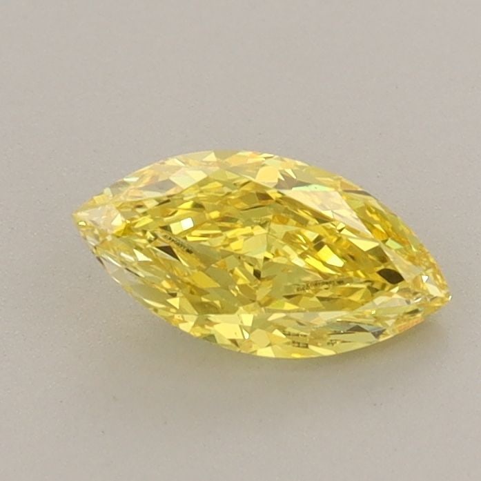 Loose Diamond - MARQUISE 0.64ct Fancy Vivid Yellow VS1: Loose Diamond - MARQUISE 0.64ct Fancy Vivid Yellow VS1 Source: This is a real non-mined Diamond that has been grown in a lab Shape: MARQUISE Carats: 0.64 Color: Fancy Vivid Yellow Certification: IGI V