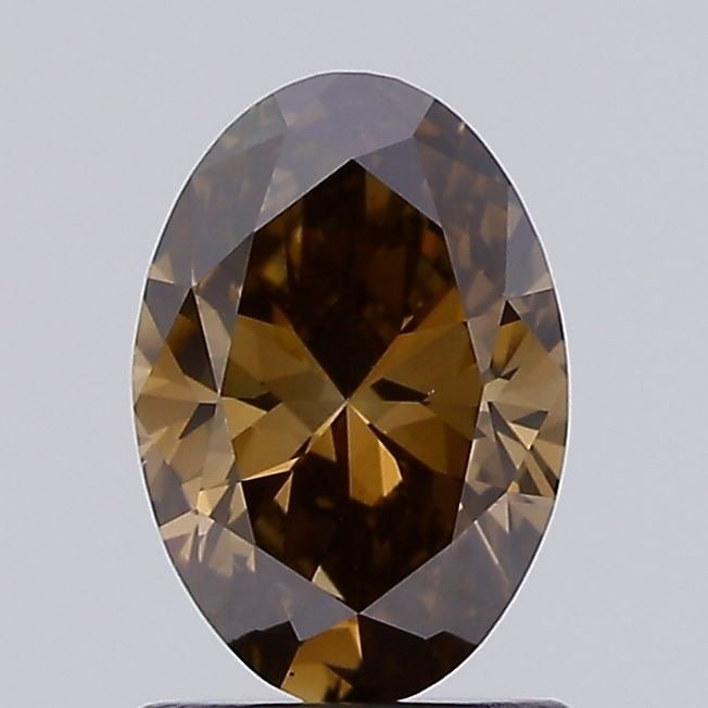 Loose Diamond - OVAL 1.07ct Fancy Brown VS1: Loose Diamond - OVAL 1.07ct Fancy Brown VS1 Source: This is a real non-mined Diamond that has been grown in a lab Shape: OVAL Carats: 1.07 Color: Fancy Brown Certification: IGI Video: