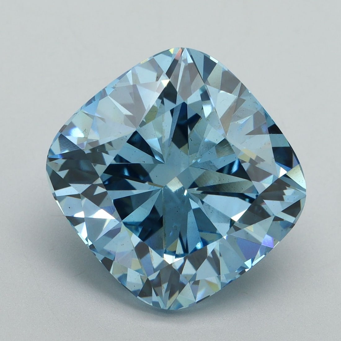 Loose Diamond - CUSHION BRILLIANT 10.06ct Fancy Vivid Blue VS2: Loose Diamond - CUSHION BRILLIANT 10.06ct Fancy Vivid Blue VS2 Source: This is a real non-mined Diamond that has been grown in a lab Shape: CUSHION BRILLIANT Carats: 10.06 Color: Fancy Vivid Blue Cert