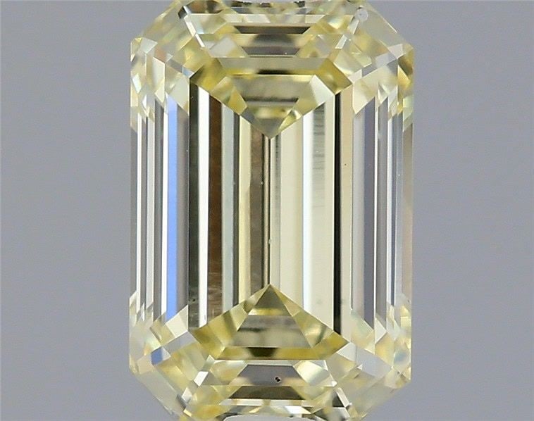 Loose Diamond - EMERALD 0.93ct Fancy Light Yellow VS1: Loose Diamond - EMERALD 0.93ct Fancy Light Yellow VS1 Source: This is a real non-mined Diamond that has been grown in a lab Shape: EMERALD Carats: 0.93 Color: Fancy Light Yellow Certification: IGI Vid