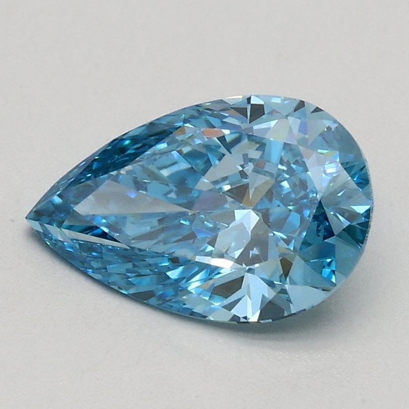 Loose Diamond - PEAR 0.94ct Fancy Vivid Blue VS1: Loose Diamond - PEAR 0.94ct Fancy Vivid Blue VS1 Source: This is a real non-mined Diamond that has been grown in a lab Shape: PEAR Carats: 0.94 Color: Fancy Vivid Blue Certification: IGI Video: