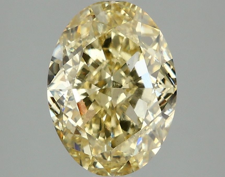 Loose Diamond - OVAL 3.06ct Fancy Intense Yellow VS2: Loose Diamond - OVAL 3.06ct Fancy Intense Yellow VS2 Source: This is a real non-mined Diamond that has been grown in a lab Shape: OVAL Carats: 3.06 Color: Fancy Intense Yellow Certification: IGI Video