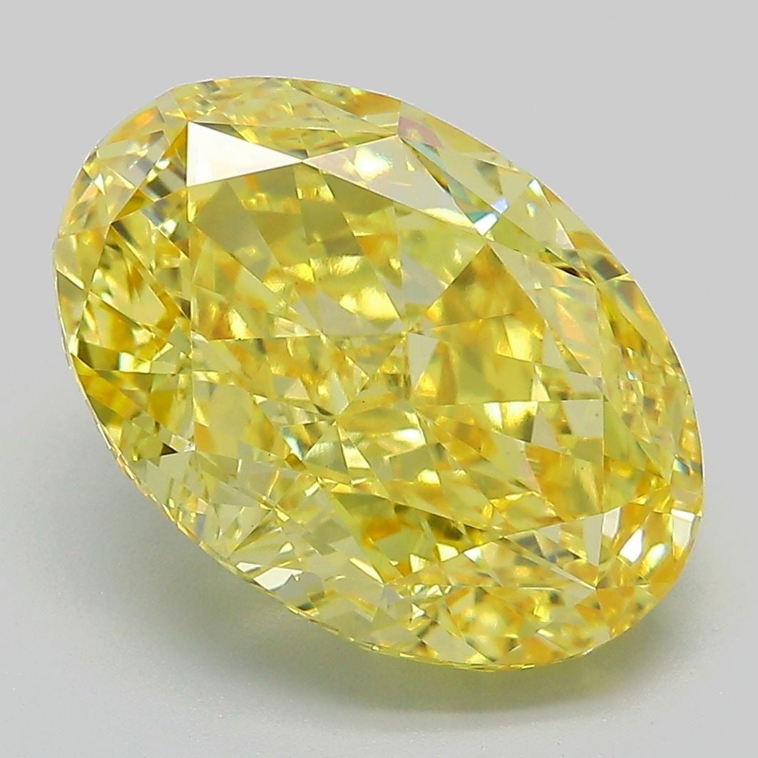 Loose Diamond - OVAL 7.66ct Fancy Vivid Yellow VVS2: Loose Diamond - OVAL 7.66ct Fancy Vivid Yellow VVS2 Source: This is a real non-mined Diamond that has been grown in a lab Shape: OVAL Carats: 7.66 Color: Fancy Vivid Yellow Certification: IGI Video: