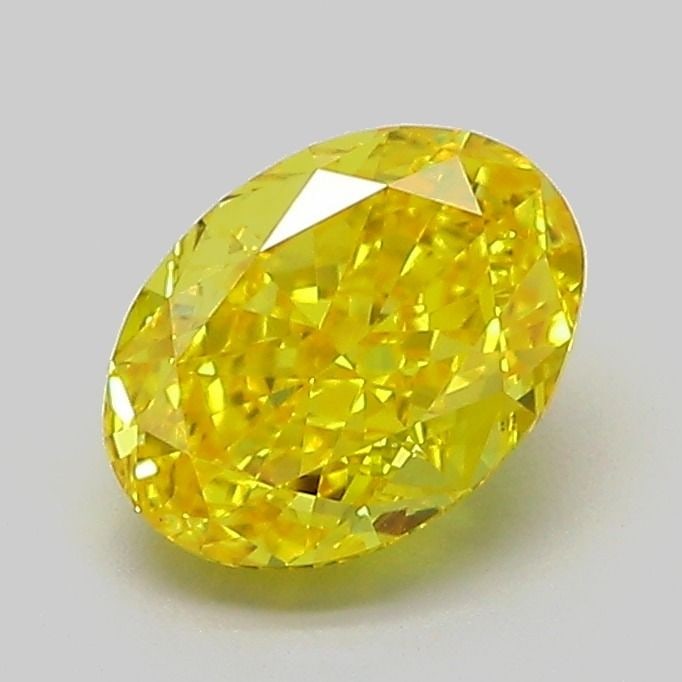 Loose Diamond - OVAL 1.19ct Fancy Vivid Yellow VS1: Loose Diamond - OVAL 1.19ct Fancy Vivid Yellow VS1 Source: This is a real non-mined Diamond that has been grown in a lab Shape: OVAL Carats: 1.19 Color: Fancy Vivid Yellow Certification: IGI Video: