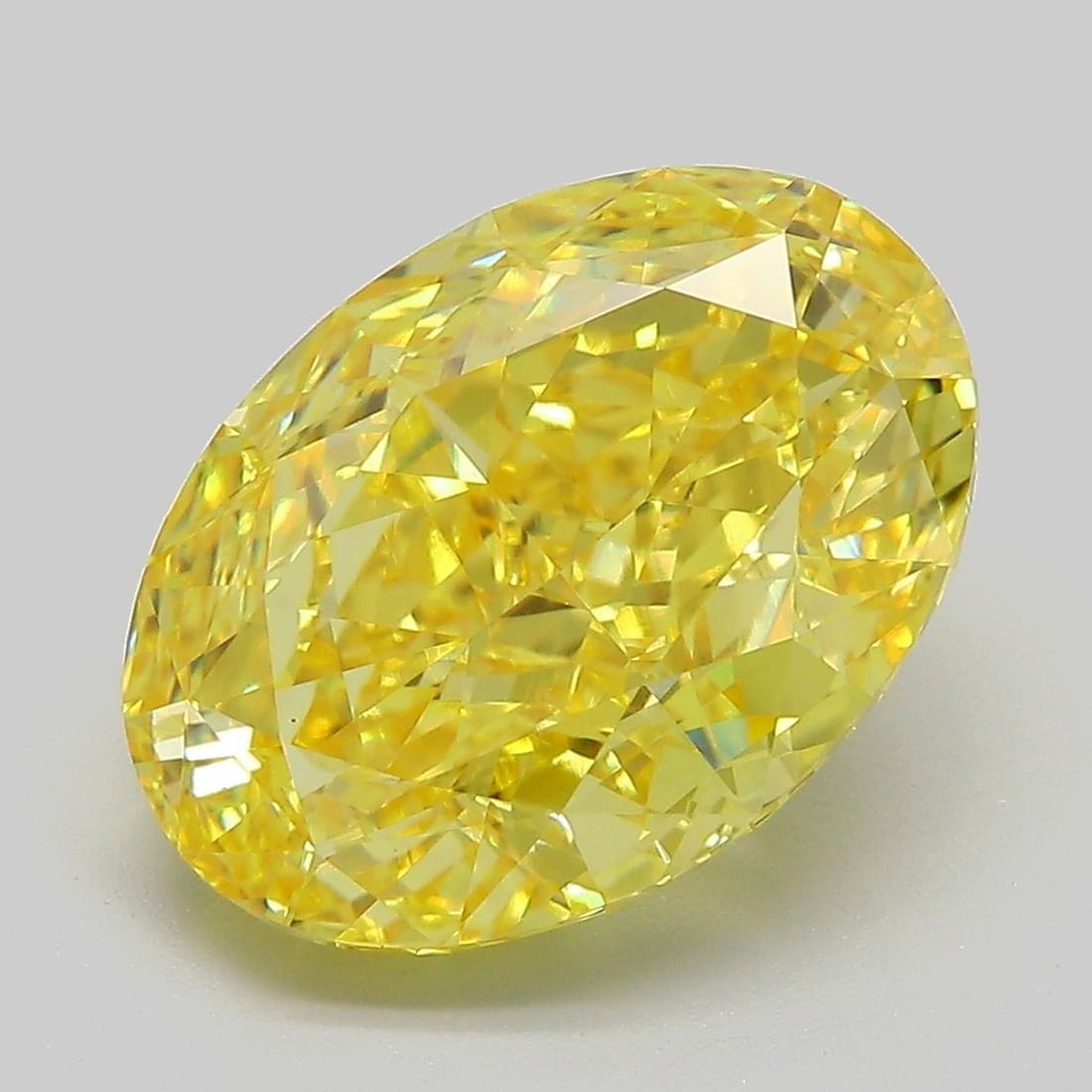 Loose Diamond - OVAL 6.37ct Fancy Vivid Yellow VS1: Loose Diamond - OVAL 6.37ct Fancy Vivid Yellow VS1 Source: This is a real non-mined Diamond that has been grown in a lab Shape: OVAL Carats: 6.37 Color: Fancy Vivid Yellow Certification: IGI Video: