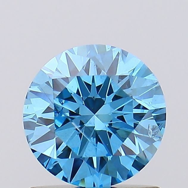 Loose Diamond - ROUND 0.99ct Fancy Vivid Blue I1: Loose Diamond - ROUND 0.99ct Fancy Vivid Blue I1 Source: This is a real non-mined Diamond that has been grown in a lab Shape: ROUND Carats: 0.99 Color: Fancy Vivid Blue Certification: IGI Video: