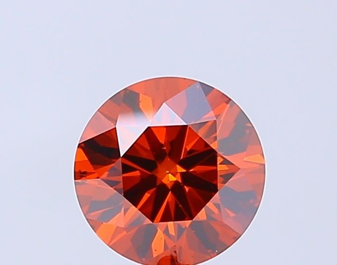Loose Diamond - ROUND 1.21ct Fancy Vivid Brownish Orange VS2: Loose Diamond - ROUND 1.21ct Fancy Vivid Brownish Orange VS2 Source: This is a real non-mined Diamond that has been grown in a lab Shape: ROUND Carats: 1.21 Color: Fancy Vivid Brownish Orange Certific