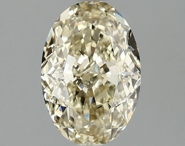 Loose Diamond - OVAL 1.59ct Fancy Yellow VVS1: Loose Diamond - OVAL 1.59ct Fancy Yellow VVS1 Source: This is a real non-mined Diamond that has been grown in a lab Shape: OVAL Carats: 1.59 Color: Fancy Yellow Certification: IGI Video: